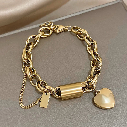 Bracelet massif avec cœur | Or