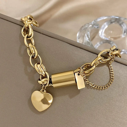Bracelet massif avec cœur | Or