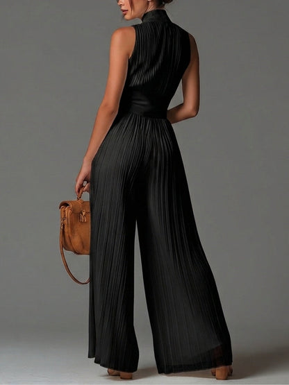 Vittoria · Combinaison noire en mousseline à col V, sans manches, zippée, plissée, pantalon large