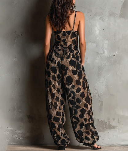 Roberta · Combinaison ample en mousseline noire à imprimé animalier, col dos-nu et pantalon large