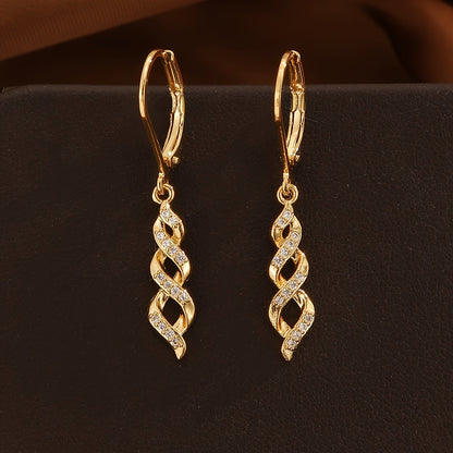Ava Boucles d'oreilles Shimmer Twist | Or